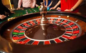 Antarmuka permainan Quickspin menampilkan gulungan dan tombol kontrol